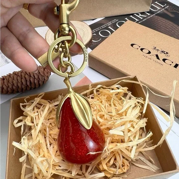 Coach Sparkling Red and Gold Pear Key Holder - Picture 3 of 6